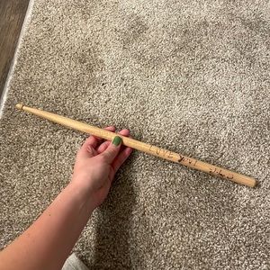 Lany signed drumstick by Jake Goss / Paul Klein